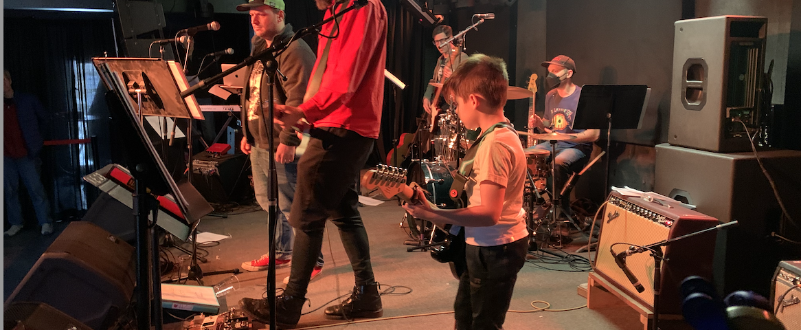 The stage at Deep Dive in Ithaca with my son playing guitar.